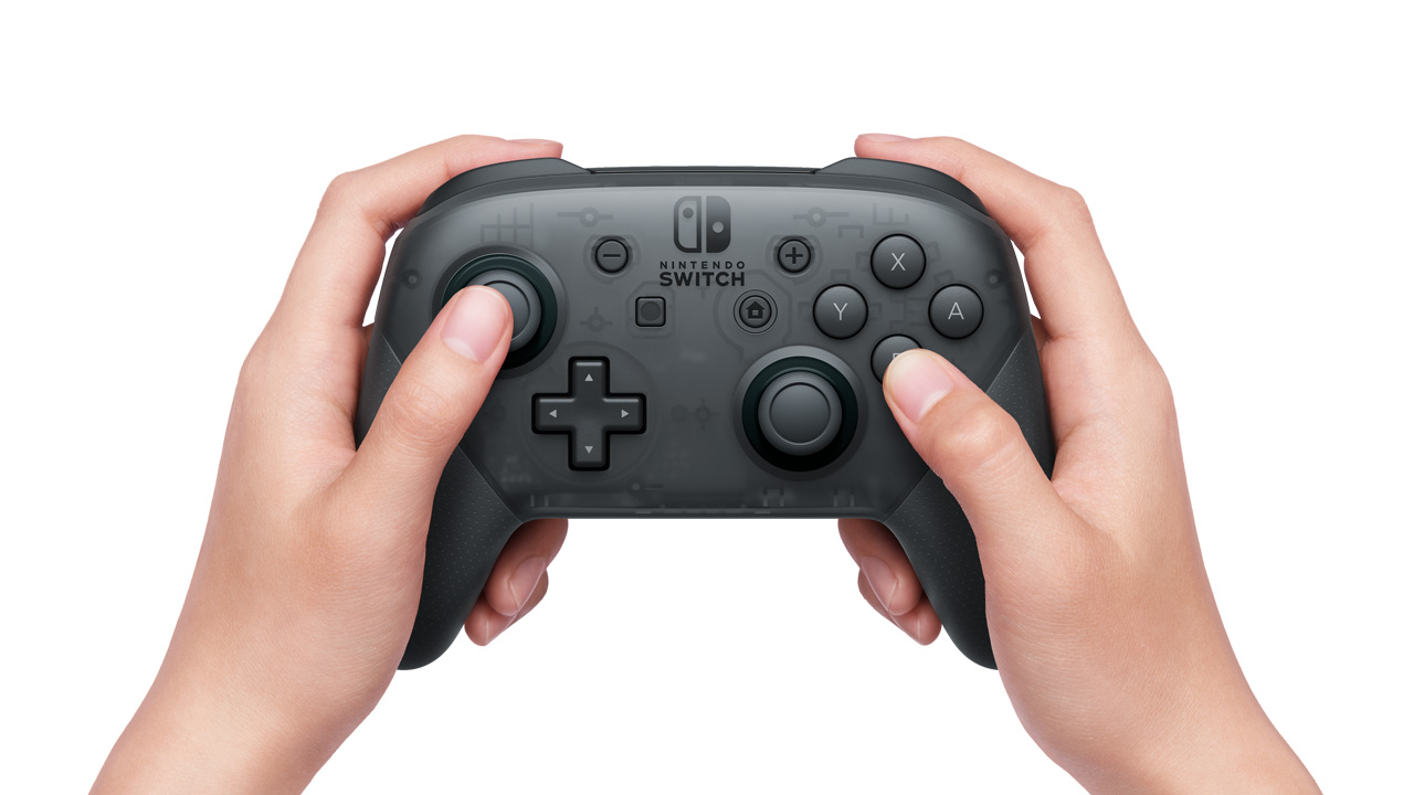 Holding a Nintendo Switch Pro Controller