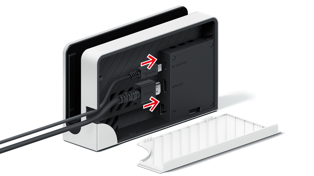 Insert the AC adapter into the top port, insert the HDMI cable into the centre port, then close the cover.